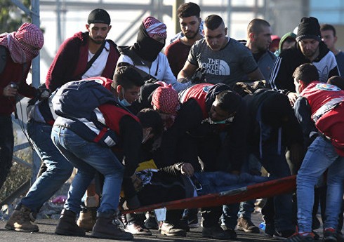 Qəzzada humanitar yardım almaq istəyən 900-ə yaxın fələstinli ölüb